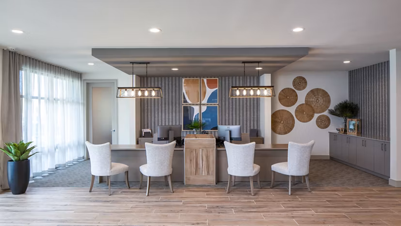 Clubhouse featuring modern design and leasing office at Bellrock Memorial Apartments