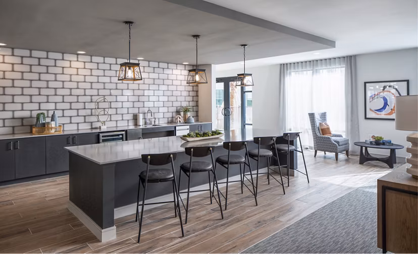 Welcoming clubhouse featuring modern decor and seating at Bellrock Memorial Apartments
