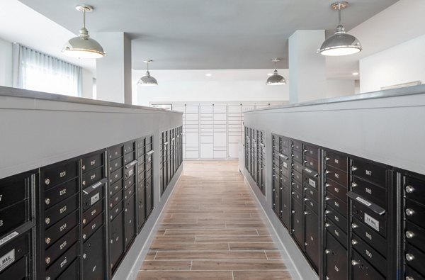 Clubhouse mail room with modern parcel lockers at Bellrock Memorial Apartments