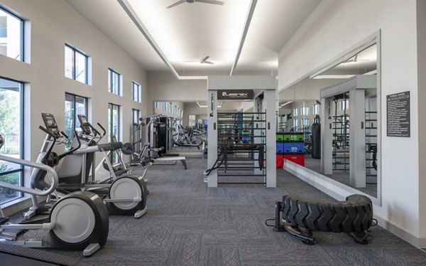 fitness center at Bellrock La Frontera Apartments 