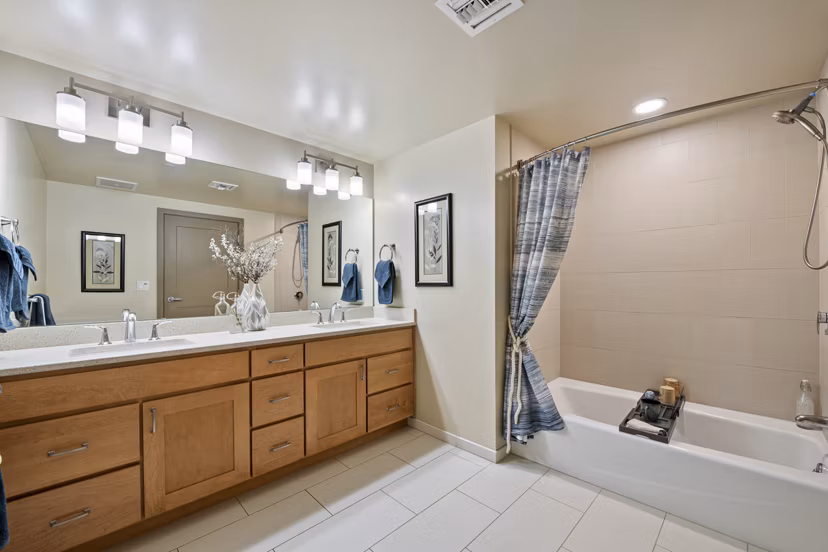 Modern bathroom featuring sleek fixtures and spacious design at City Creek Landing Apartments