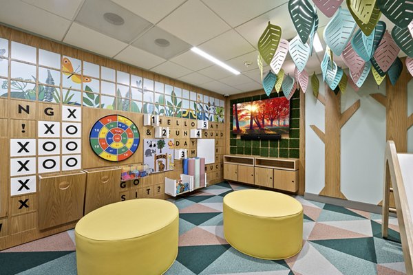 Modern clubhouse with cozy seating at City Creek Landing Apartments