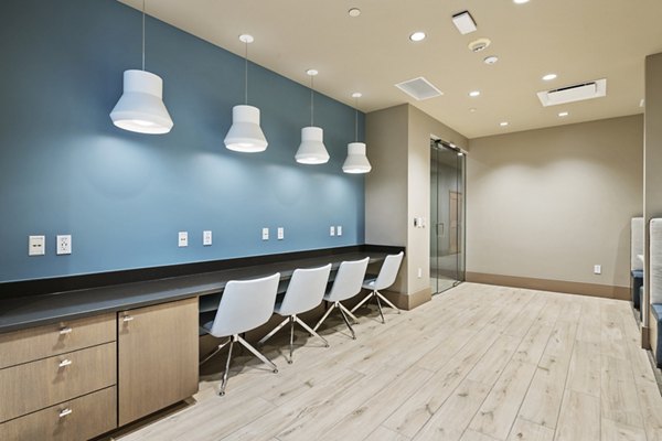Clubhouse featuring modern design and comfortable seating at City Creek Landing Apartments