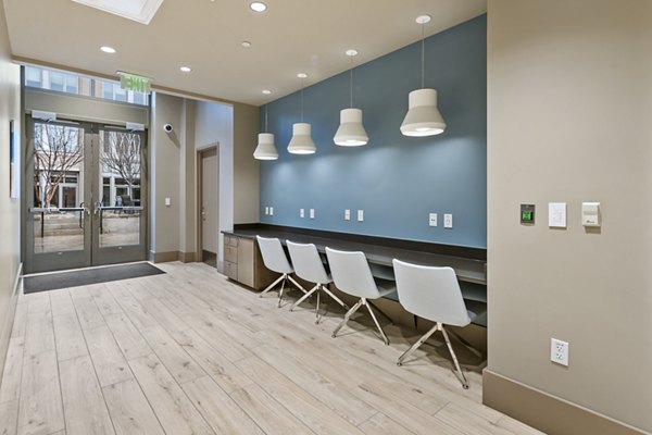 Elegant clubhouse with modern decor at City Creek Landing Apartments, offering luxury spaces for socializing and relaxation