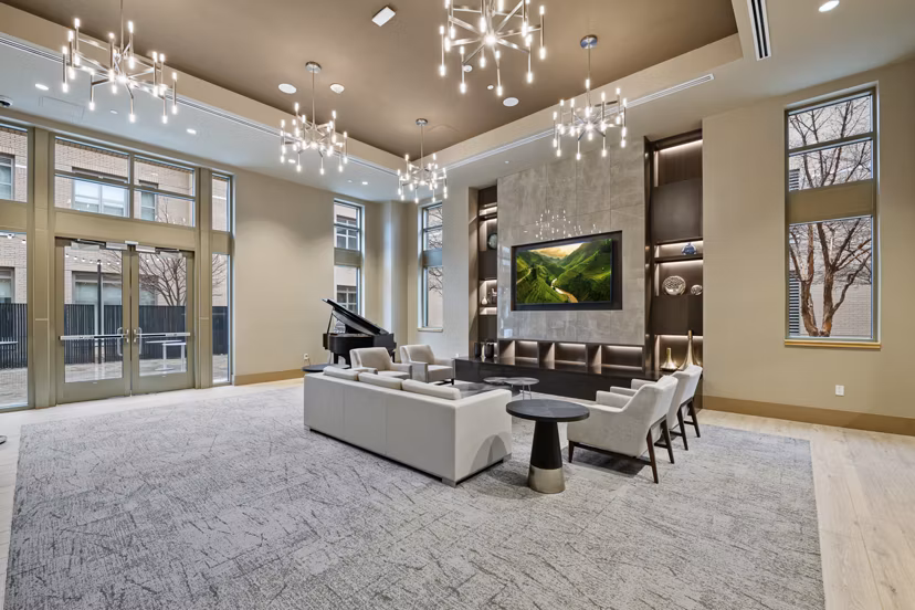 Elegant clubhouse featuring modern furnishings at City Creek Landing Apartments
