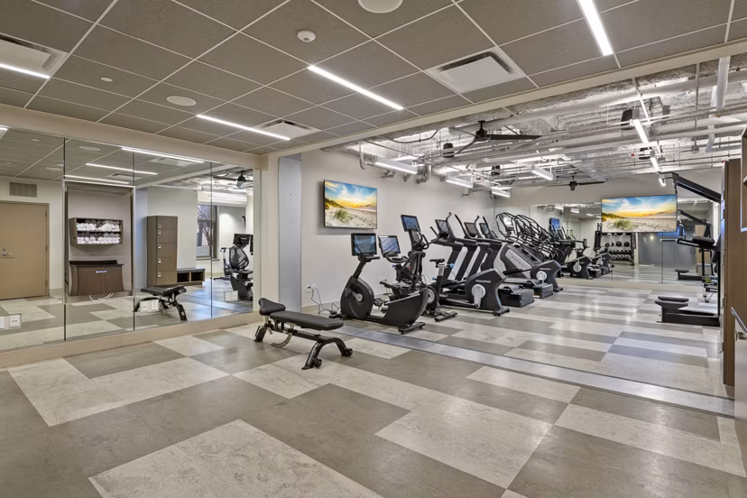 State-of-the-art fitness center with modern equipment at City Creek Landing Apartments offering luxury living amenities