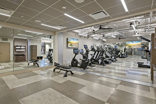 State-of-the-art fitness center with modern equipment at City Creek Landing Apartments offering luxury living amenities