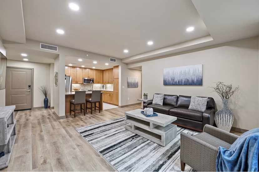 Elegant living room with modern furnishings at City Creek Landing Apartments
