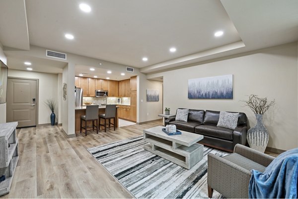 Elegant living room with modern furnishings at City Creek Landing Apartments