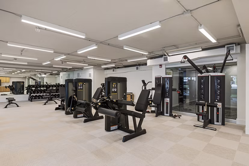 Yoga and spin studio featuring modern equipment at Brigham Apartments