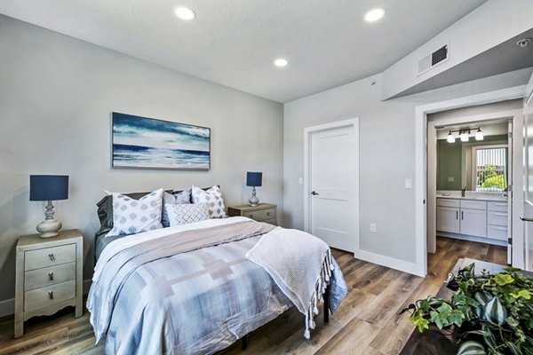 Cozy bedroom with modern decor at Colonial Court Apartments in Greystar's luxury living community