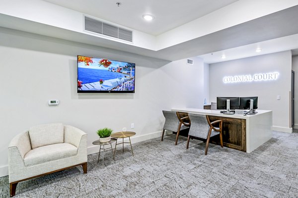 Colonial Court Apartments: Elegant clubhouse and leasing office with modern design features