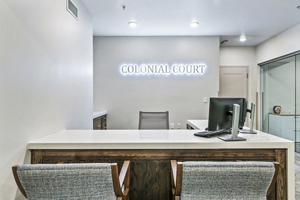 Colonial Court Apartments: Elegant clubhouse and leasing office with modern design