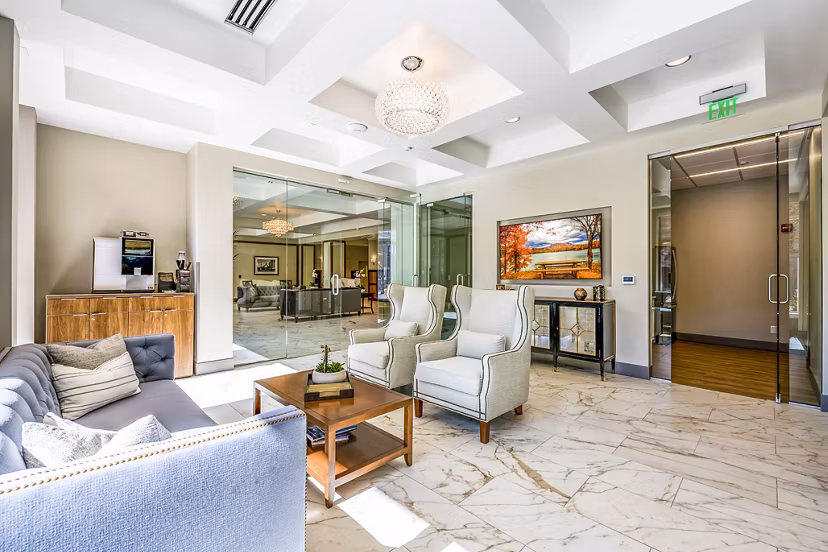 Clubhouse lobby featuring modern decor and seating at Eagle Gate Apartments