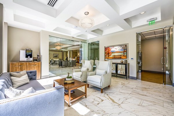 Clubhouse lobby featuring modern decor and seating at Eagle Gate Apartments