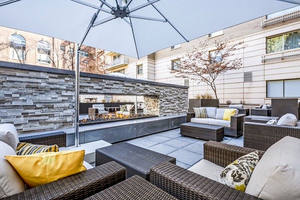 Cozy fire pit and patio at Eagle Gate Apartments, ideal for evening gatherings