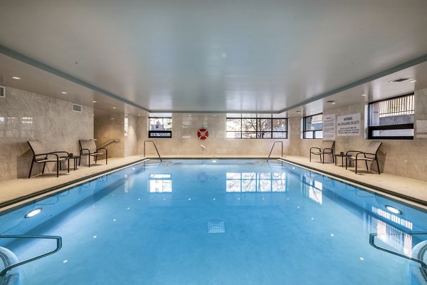 Resort-style pool area at Eagle Gate Apartments offering relaxation and leisure Perfect for residents seeking luxury living amenities