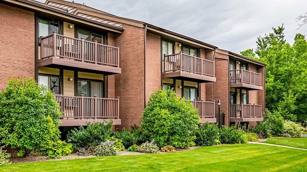 Garden Apartments: Contemporary building with landscaped grounds, offering luxury living in a serene setting