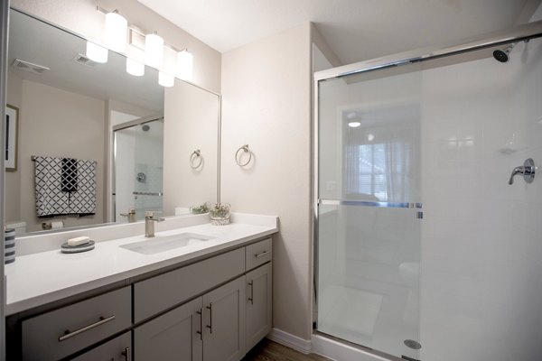 Modern bathroom with elegant fixtures at Avana Coronado Apartments