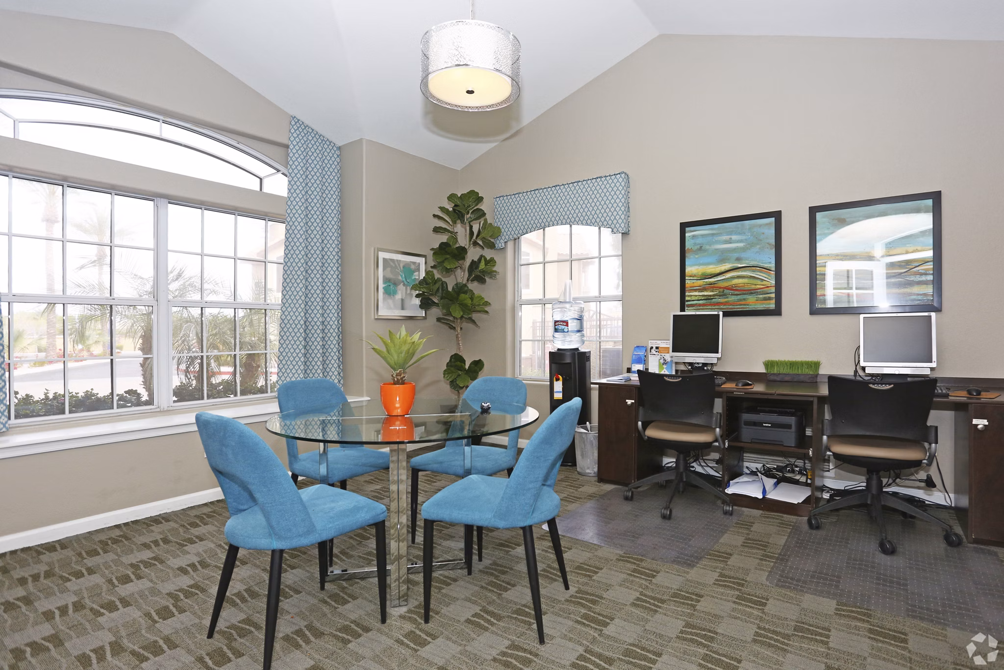 Clubhouse with modern design and communal seating at Avana Coronado Apartments