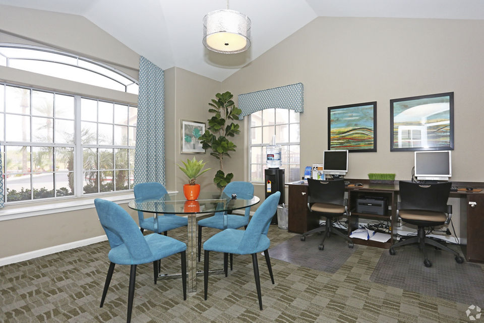 Clubhouse with modern design and communal seating at Avana Coronado Apartments