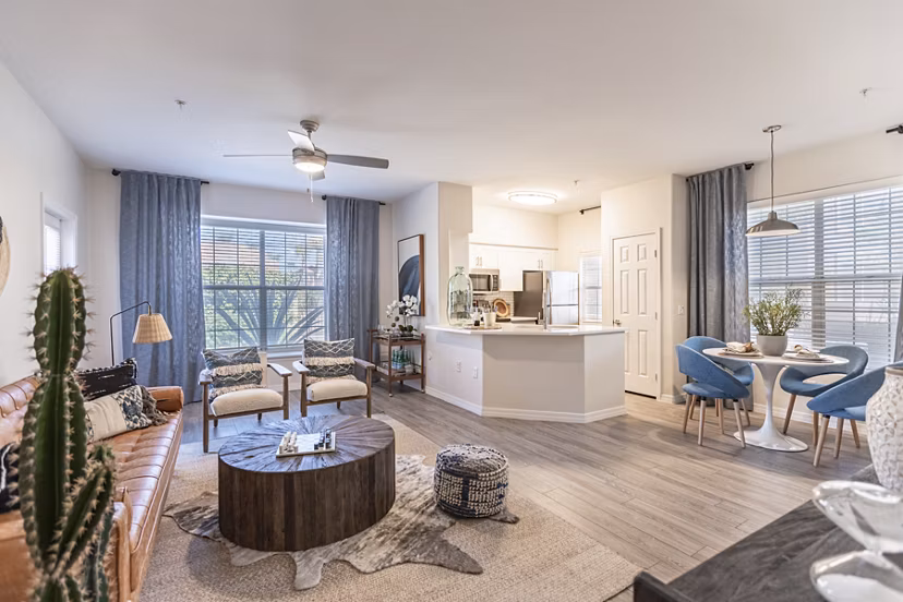 Modern kitchen with stainless steel appliances and granite countertops in Avana Coronado Apartments