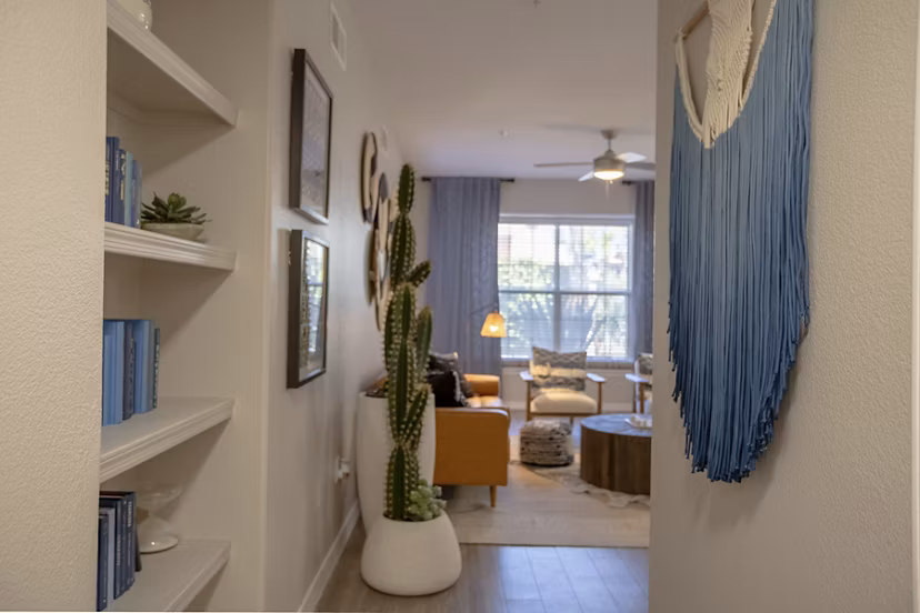 Stylish hallway with modern lighting and decor at Avana Coronado Apartments