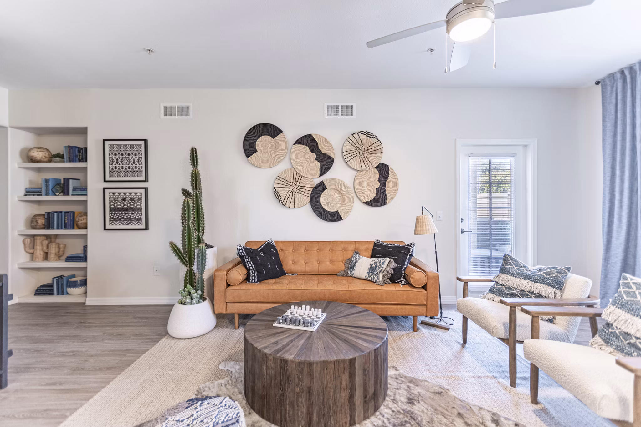 Spacious living room with modern furnishings in Avana Coronado Apartments