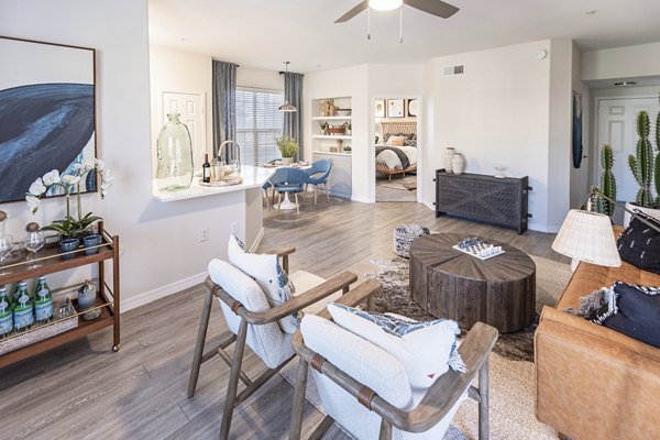 Spacious living room with modern decor in Avana Coronado Apartments