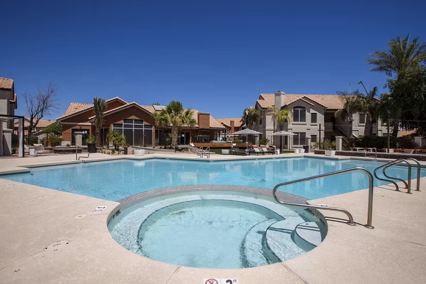 Relaxing outdoor pool area at Avana Coronado Apartments