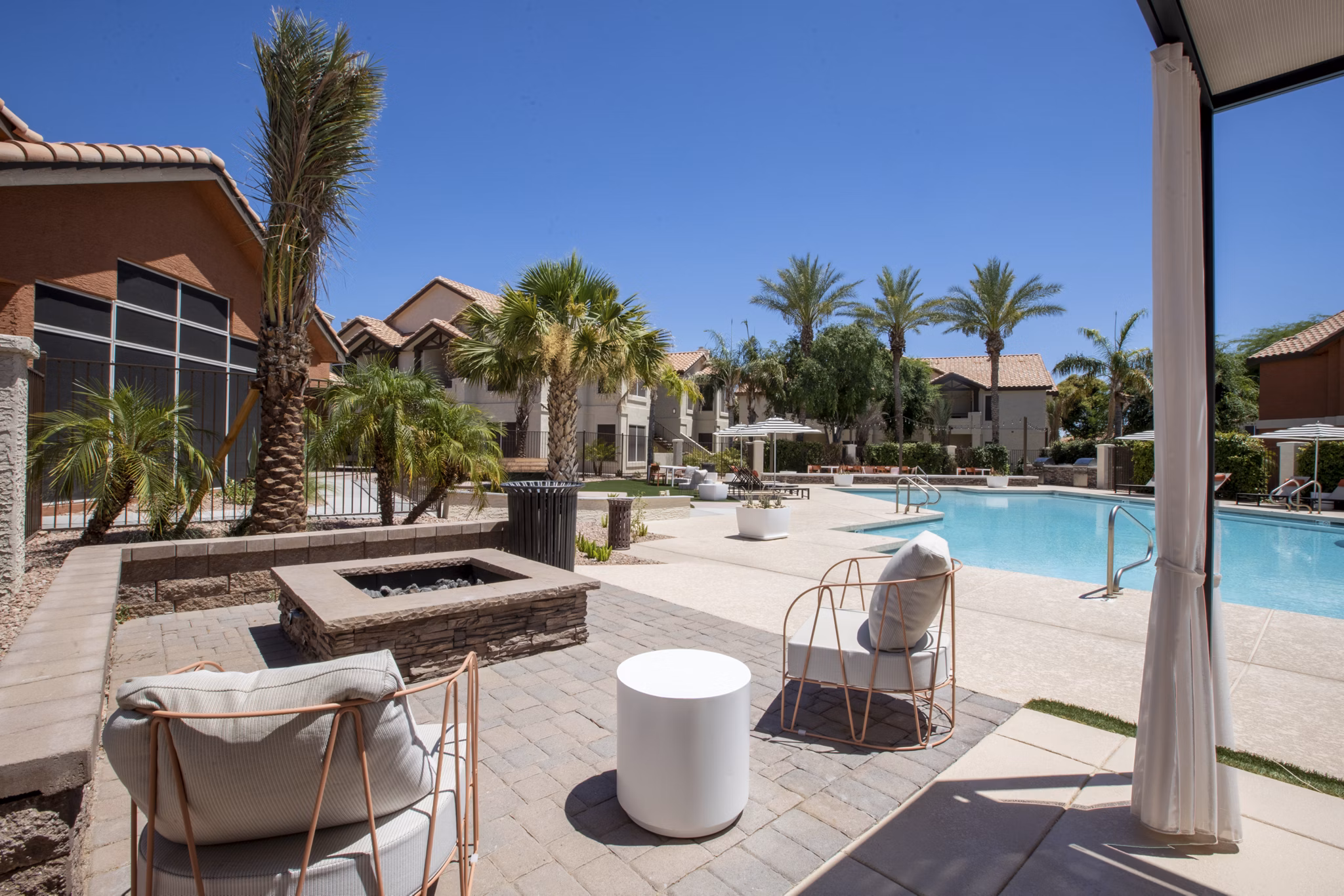 Avana Coronado Apartments: Inviting communal lounge with comfortable seating and modern decor