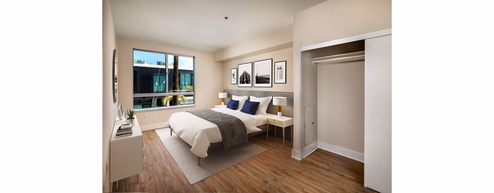 Bedroom with modern decor and ample natural light at Venice on Rose Apartments, part of Greystar luxury properties in Los Angeles