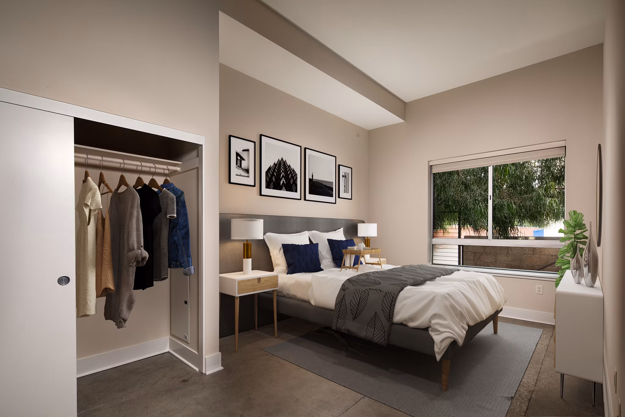 Cozy bedroom with modern decor at Venice on Rose Apartments