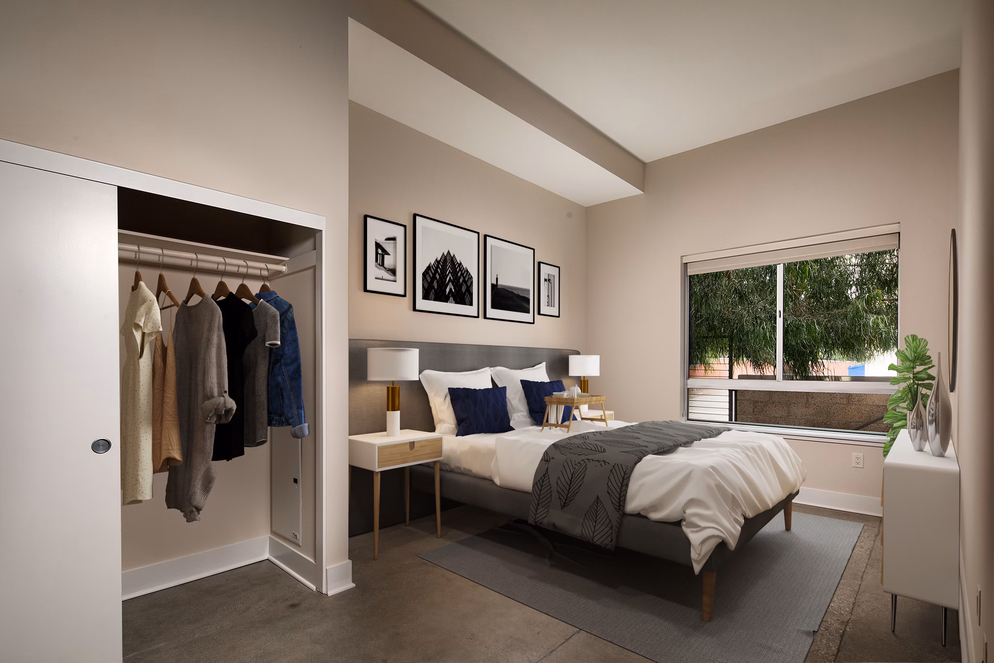 Cozy bedroom with modern decor at Venice on Rose Apartments