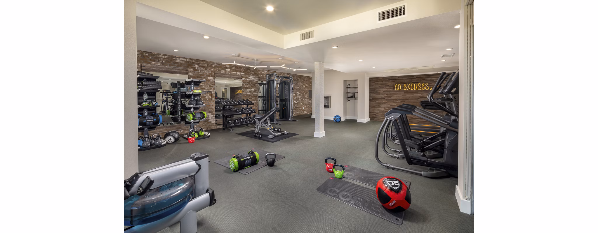 Fully equipped fitness center at Venice on Rose Apartments with state-of-the-art equipment and spacious workout areas