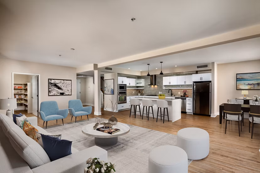 Spacious living room with modern decor at Venice on Rose Apartments, offering luxury living by the beach