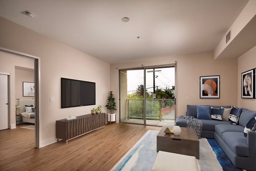 Spacious living room with modern decor at Venice on Rose Apartments