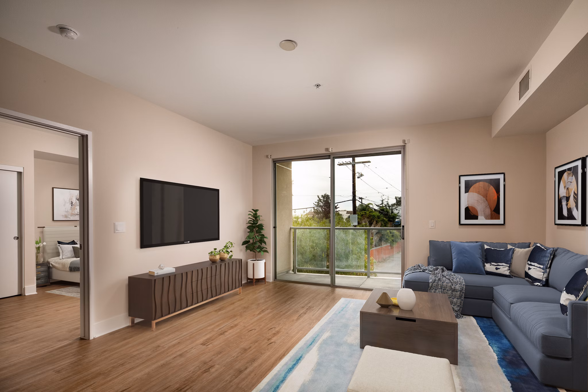 Spacious living room with modern decor at Venice on Rose Apartments