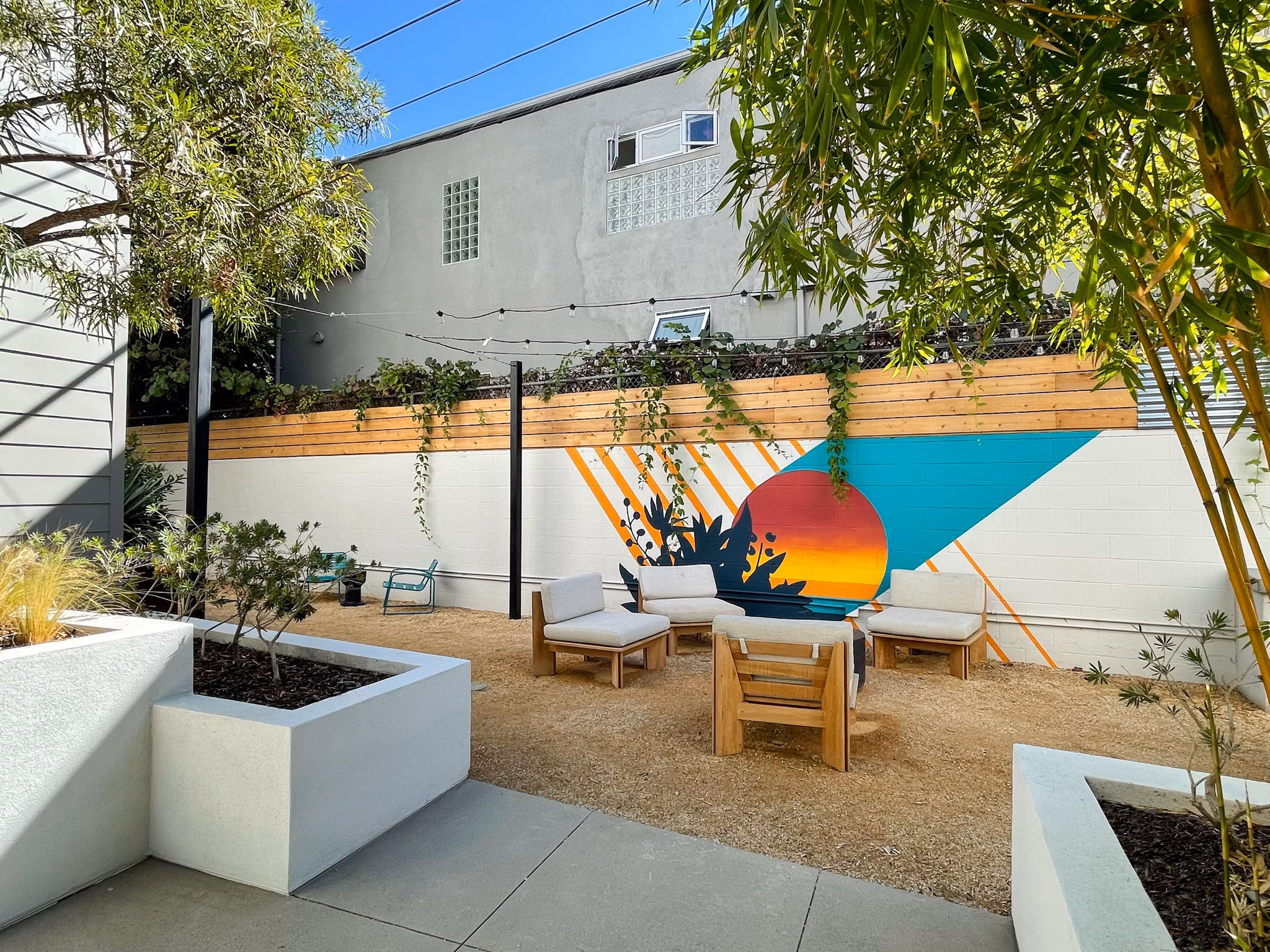 Venice on Rose Apartments: Tranquil courtyard with lush landscaping in a luxury setting