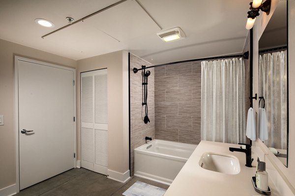 Bathroom featuring modern fixtures at Venice on Rose Apartments