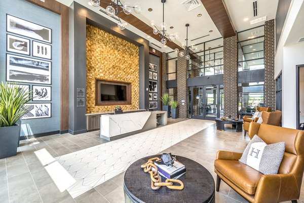 Elegant clubhouse lobby featuring modern decor at The Holston Apartments, perfect for socializing and relaxation
