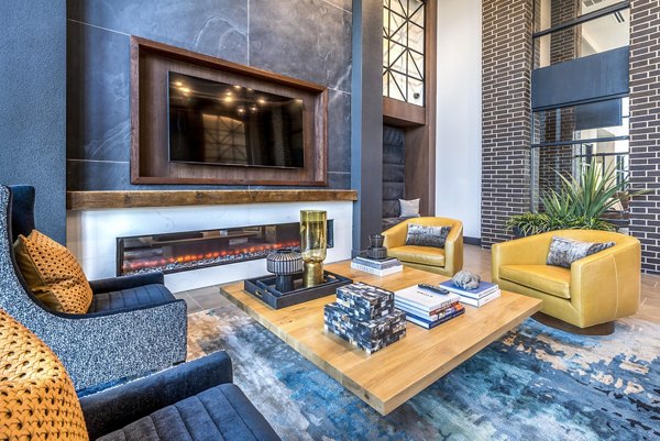 Clubhouse lobby with modern seating and open design at The Holston Apartments