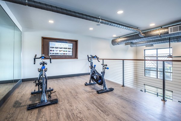 Modern spin studio with state-of-the-art equipment at The Holston Apartments