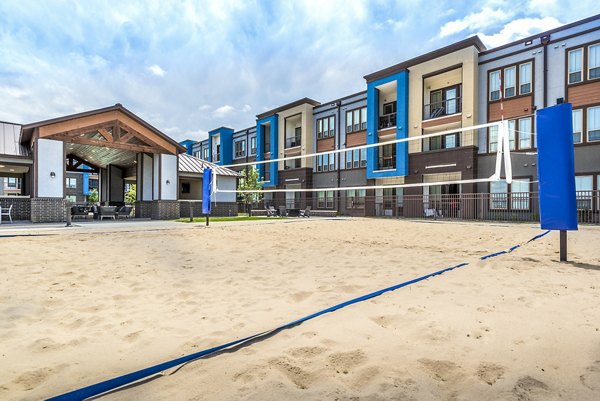 beach volleyball court at The Holston Apartments
