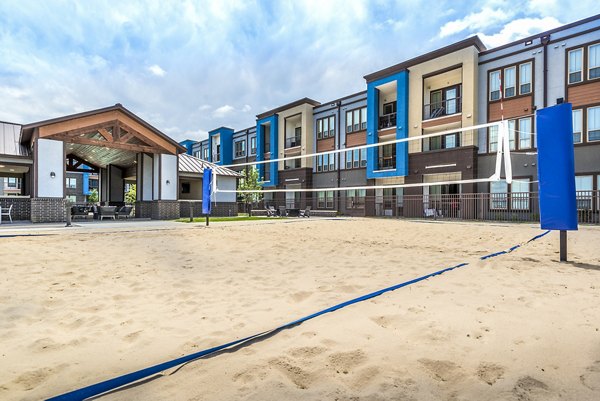 Beach volleyball court at The Holston Apartments offers active lifestyle by the ocean Ideal for sports enthusiasts seeking community engagements