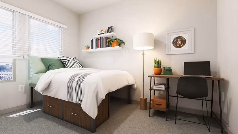 Cozy bedroom with modern decor at Union on Frank Apartments