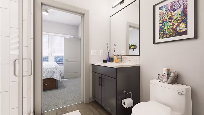 Modern bathroom with sleek fixtures at Union on Frank Apartments, featuring luxury design and amenities in a vibrant community setting