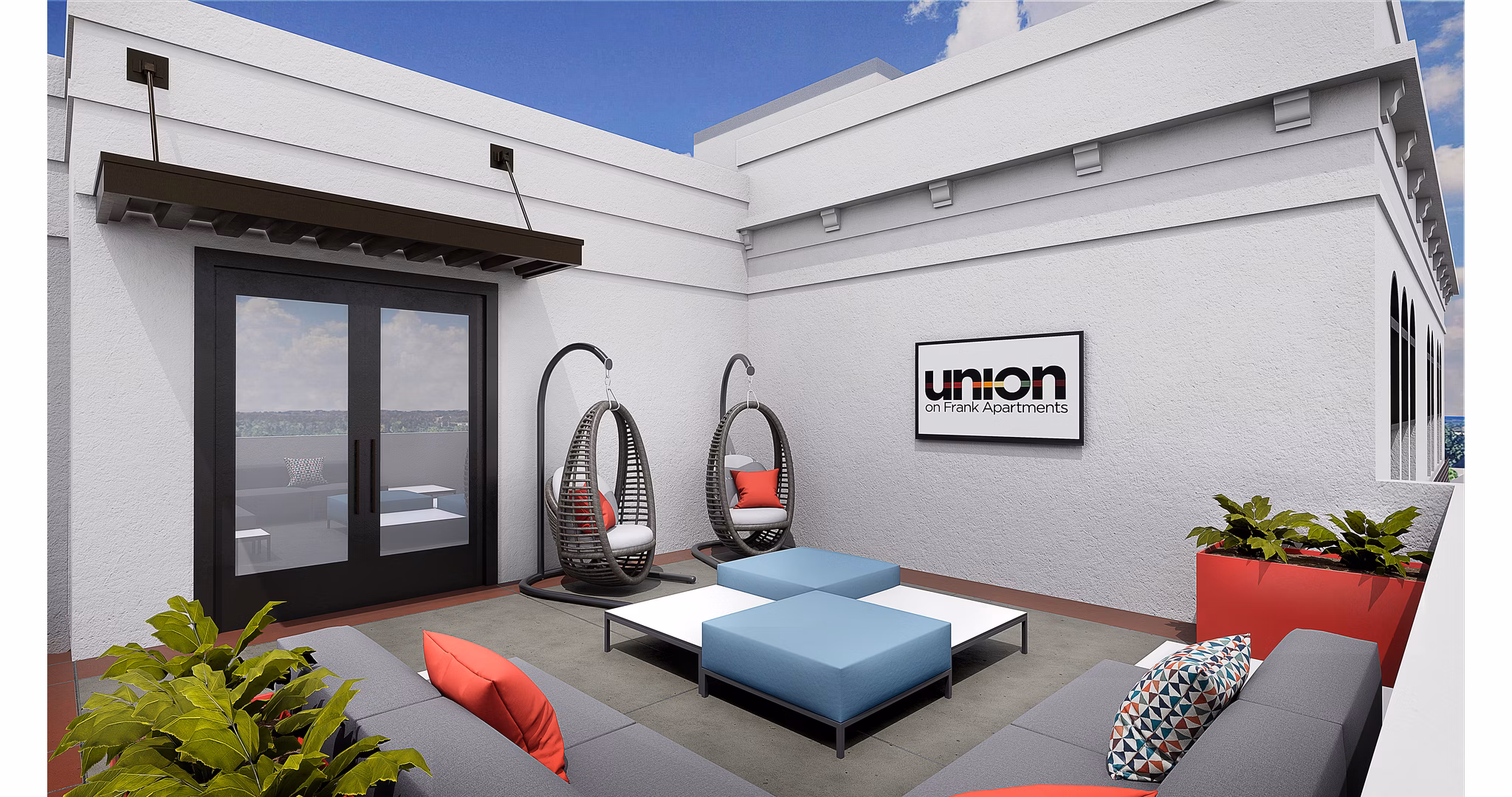 Chic outdoor patio with modern seating at Union on Frank Apartments