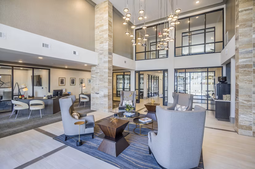 Elegant clubhouse with cozy seating at luxurious Leigh House Apartments