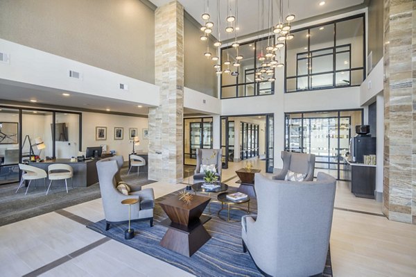 Elegant clubhouse with cozy seating at luxurious Leigh House Apartments